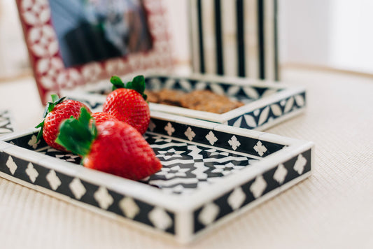 Decorative tray with strawberries on a table
