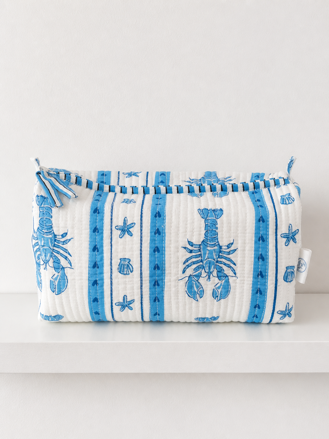 handmade quilted pouch with blue lobster design
