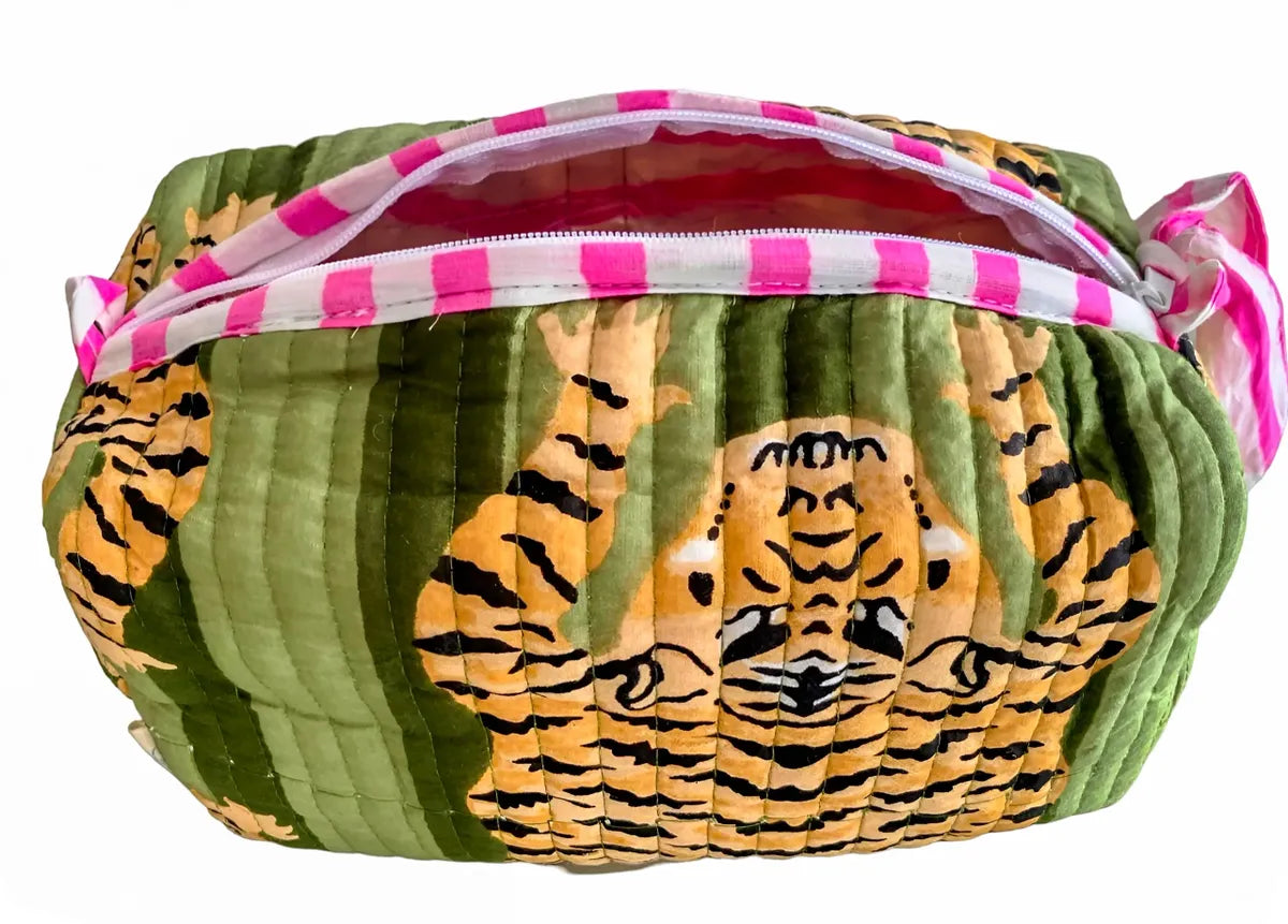 Pouch with tiger pattern and pink zipper on a white background
