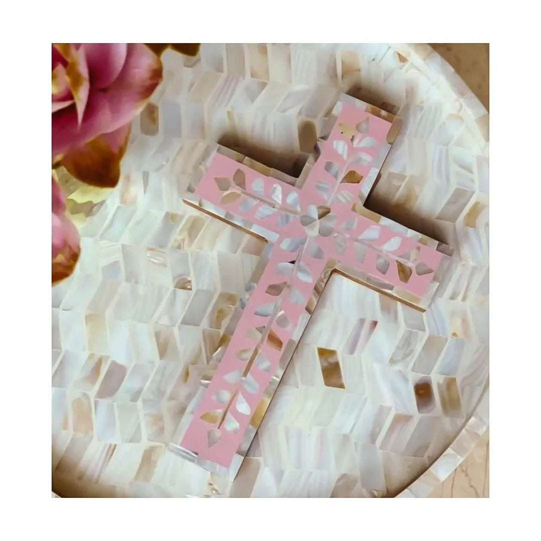 Pink cross on a mosaic background with flowers